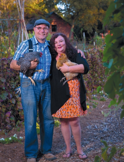 Tri Cycle Farms founder Don Bennett with his partner, Kelly Bassemier, and two of their chickens, Lefty and Daisy.