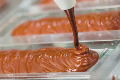 melted chocolate squeezed into molds
