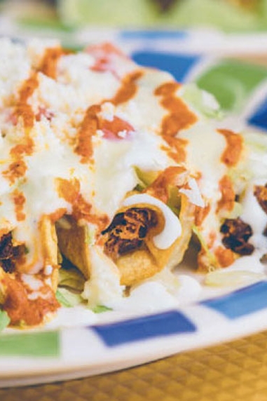 Taqueria Mexico’s flautas de pierna are rolled tacos stuffed with pork leg. 
